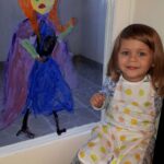 kids drawing on windows